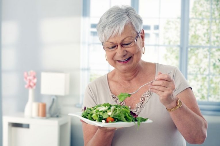 elderly-woman-eating-salad